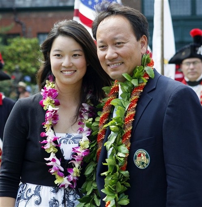 Michael Chang, 36, of the USA poses with his fiancee, Amber Liu, after he was inducted into the International Tennis Hall of Fame in Newport, R.I. Saturday, July 12, 2008. (AP Photo/Elise Amendola)